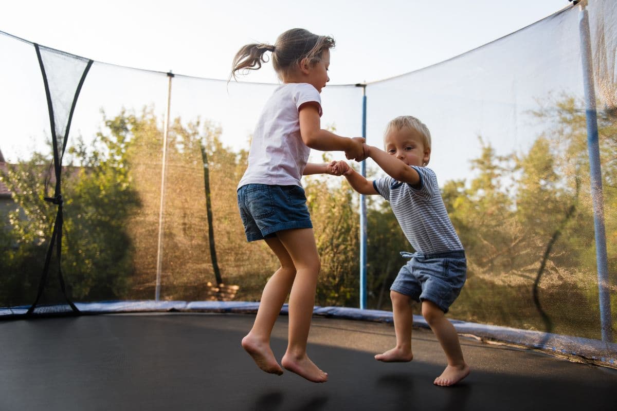 Kids bouncing on a trampoline